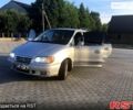 Серый Хендай Траджет, объемом двигателя 20 л и пробегом 285 тыс. км за 5100 $, фото 5 на Automoto.ua