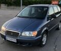 Синий Хендай Траджет, объемом двигателя 2 л и пробегом 382 тыс. км за 2600 $, фото 1 на Automoto.ua
