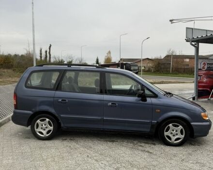 Синий Хендай Траджет, объемом двигателя 2 л и пробегом 300 тыс. км за 2100 $, фото 4 на Automoto.ua