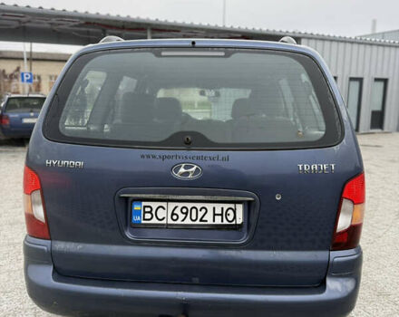 Синий Хендай Траджет, объемом двигателя 2 л и пробегом 300 тыс. км за 2100 $, фото 4 на Automoto.ua