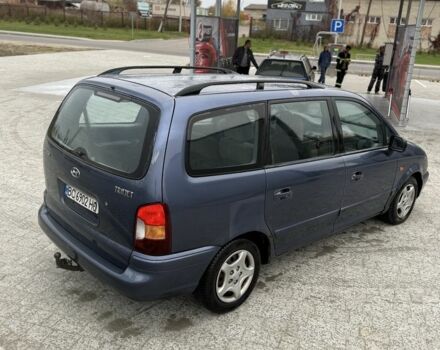 Синий Хендай Траджет, объемом двигателя 2 л и пробегом 300 тыс. км за 2100 $, фото 1 на Automoto.ua