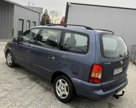 Синий Хендай Траджет, объемом двигателя 2 л и пробегом 300 тыс. км за 2100 $, фото 3 на Automoto.ua
