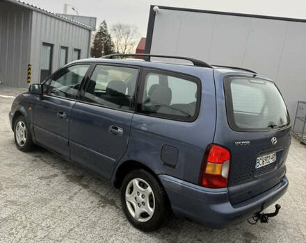 Синий Хендай Траджет, объемом двигателя 2 л и пробегом 300 тыс. км за 2100 $, фото 1 на Automoto.ua
