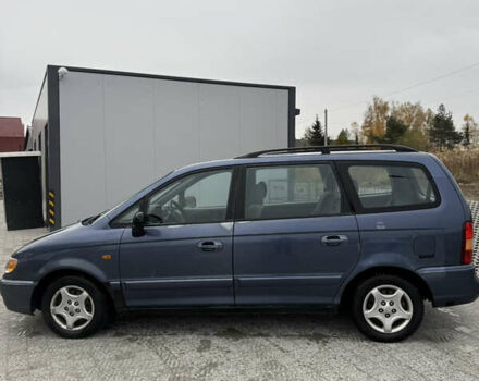 Синий Хендай Траджет, объемом двигателя 2 л и пробегом 300 тыс. км за 2100 $, фото 7 на Automoto.ua