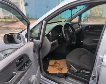 Синий Хендай Траджет, объемом двигателя 2 л и пробегом 300 тыс. км за 3900 $, фото 3 на Automoto.ua