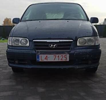Синій Хендай Траджет, об'ємом двигуна 2 л та пробігом 390 тис. км за 2500 $, фото 3 на Automoto.ua