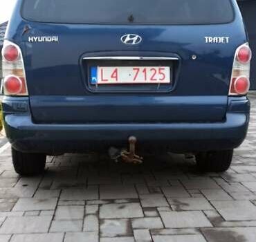Синій Хендай Траджет, об'ємом двигуна 2 л та пробігом 390 тис. км за 2500 $, фото 2 на Automoto.ua