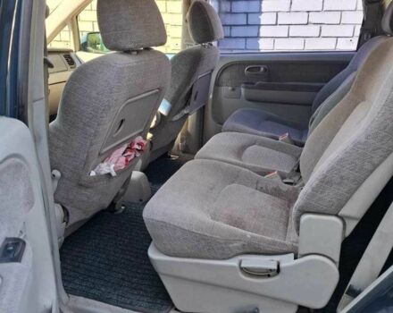 Синий Хендай Траджет, объемом двигателя 2 л и пробегом 298 тыс. км за 4000 $, фото 5 на Automoto.ua