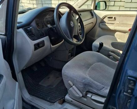 Синий Хендай Траджет, объемом двигателя 2 л и пробегом 298 тыс. км за 4000 $, фото 4 на Automoto.ua