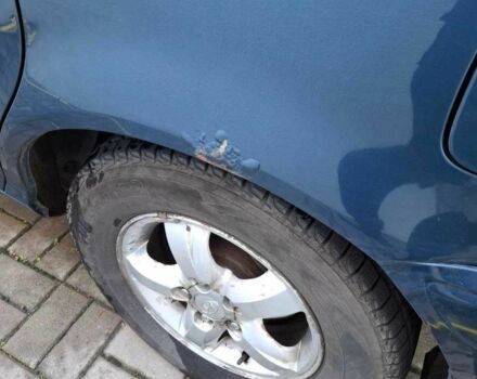 Синий Хендай Траджет, объемом двигателя 2 л и пробегом 298 тыс. км за 4000 $, фото 6 на Automoto.ua