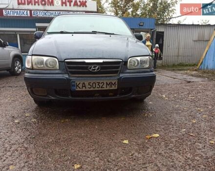 Синий Хендай Траджет, объемом двигателя 1.98 л и пробегом 250 тыс. км за 3100 $, фото 1 на Automoto.ua