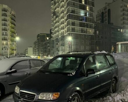 Синий Хендай Траджет, объемом двигателя 2 л и пробегом 380 тыс. км за 2500 $, фото 1 на Automoto.ua