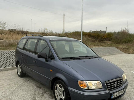 Синий Хендай Траджет, объемом двигателя 2 л и пробегом 300 тыс. км за 2100 $, фото 1 на Automoto.ua