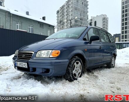 Синій Хендай Траджет, об'ємом двигуна 2 л та пробігом 380 тис. км за 2500 $, фото 1 на Automoto.ua