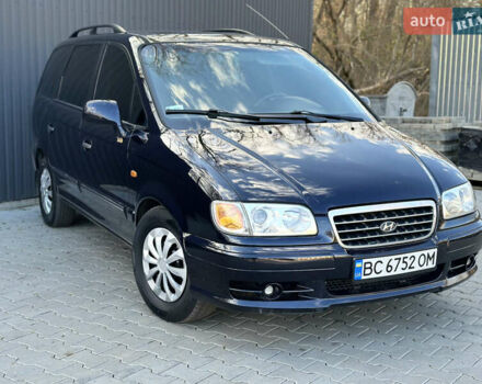 Синий Хендай Траджет, объемом двигателя 2 л и пробегом 180 тыс. км за 3750 $, фото 1 на Automoto.ua