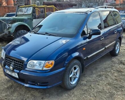 Синий Хендай Траджет, объемом двигателя 2 л и пробегом 353 тыс. км за 3750 $, фото 1 на Automoto.ua