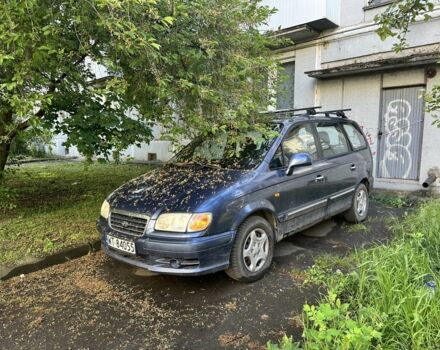 Синий Хендай Траджет, объемом двигателя 2 л и пробегом 300 тыс. км за 1900 $, фото 1 на Automoto.ua