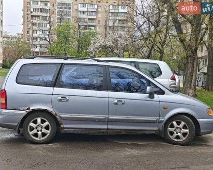 Синий Хендай Траджет, объемом двигателя 2 л и пробегом 350 тыс. км за 2100 $, фото 1 на Automoto.ua