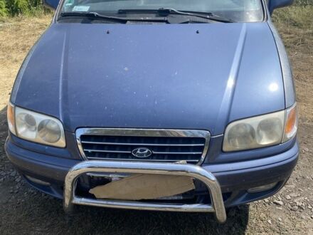 Хендай Траджет 2005 у Изюме на Automoto.ua Синій Хендай Траджет, об'ємом двигуна 2.7 л та пробігом 253 тис. км за 35000 $, фото 1 на Automoto.ua