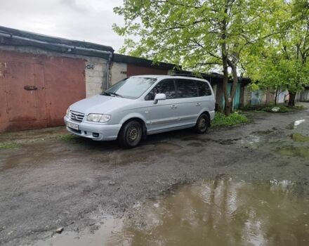 Синий Хендай Траджет, объемом двигателя 2 л и пробегом 312 тыс. км за 3511 $, фото 1 на Automoto.ua