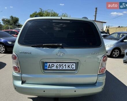 Зеленый Хендай Траджет, объемом двигателя 2 л и пробегом 260 тыс. км за 4777 $, фото 3 на Automoto.ua