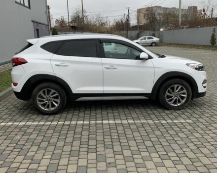 Білий Хендай Туксон, об'ємом двигуна 2 л та пробігом 150 тис. км за 14499 $, фото 2 на Automoto.ua