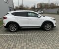 Білий Хендай Туксон, об'ємом двигуна 2 л та пробігом 150 тис. км за 14499 $, фото 2 на Automoto.ua