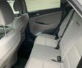 Білий Хендай Туксон, об'ємом двигуна 2 л та пробігом 150 тис. км за 14499 $, фото 5 на Automoto.ua