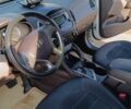 Білий Хендай Туксон, об'ємом двигуна 2 л та пробігом 120 тис. км за 11500 $, фото 2 на Automoto.ua