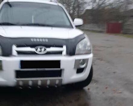 Белый Хендай Туксон, объемом двигателя 1.99 л и пробегом 191 тыс. км за 9300 $, фото 21 на Automoto.ua