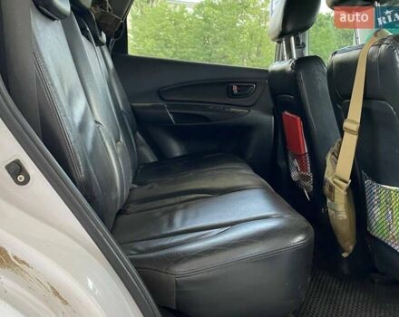 Білий Хендай Туксон, об'ємом двигуна 1.98 л та пробігом 225 тис. км за 8400 $, фото 22 на Automoto.ua