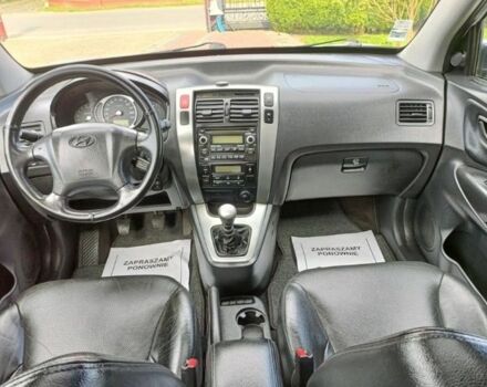 Белый Хендай Туксон, объемом двигателя 2 л и пробегом 192 тыс. км за 2227 $, фото 12 на Automoto.ua