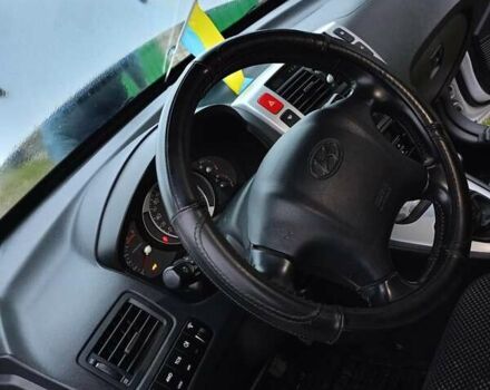 Белый Хендай Туксон, объемом двигателя 1.99 л и пробегом 191 тыс. км за 9300 $, фото 5 на Automoto.ua