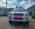 Белый Хендай Туксон, объемом двигателя 2 л и пробегом 120 тыс. км за 9600 $, фото 1 на Automoto.ua