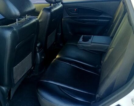 Білий Хендай Туксон, об'ємом двигуна 2 л та пробігом 228 тис. км за 7500 $, фото 4 на Automoto.ua