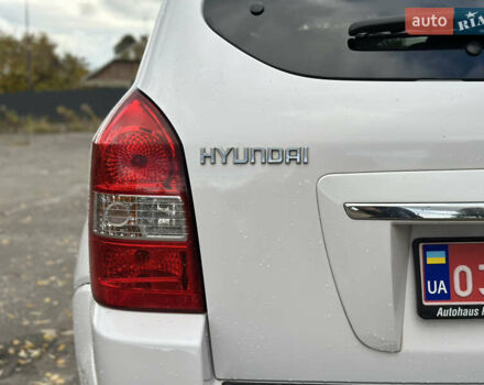 Белый Хендай Туксон, объемом двигателя 2 л и пробегом 221 тыс. км за 7700 $, фото 10 на Automoto.ua