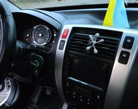 Белый Хендай Туксон, объемом двигателя 1.99 л и пробегом 191 тыс. км за 9300 $, фото 14 на Automoto.ua