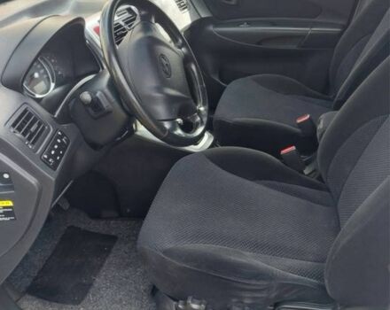 Белый Хендай Туксон, объемом двигателя 2 л и пробегом 120 тыс. км за 9600 $, фото 11 на Automoto.ua