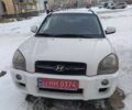 Белый Хендай Туксон, объемом двигателя 2 л и пробегом 221 тыс. км за 7800 $, фото 1 на Automoto.ua
