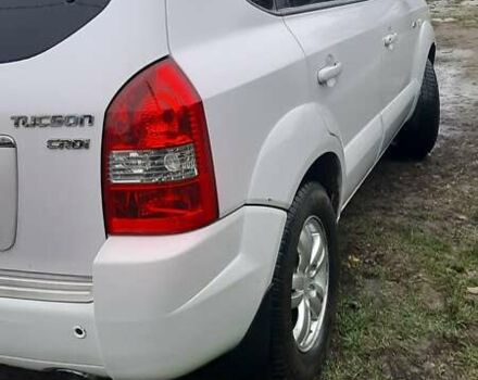 Белый Хендай Туксон, объемом двигателя 1.99 л и пробегом 191 тыс. км за 9300 $, фото 24 на Automoto.ua