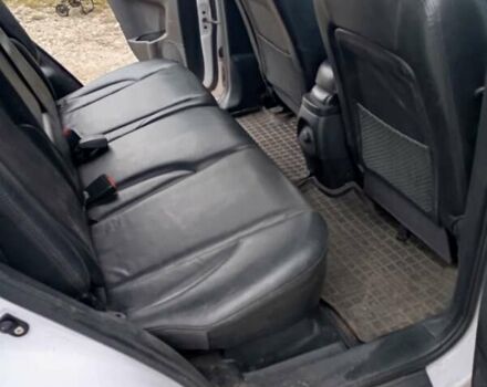 Белый Хендай Туксон, объемом двигателя 1.98 л и пробегом 200 тыс. км за 8500 $, фото 10 на Automoto.ua