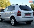 Білий Хендай Туксон, об'ємом двигуна 1.98 л та пробігом 163 тис. км за 8900 $, фото 9 на Automoto.ua