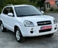 Білий Хендай Туксон, об'ємом двигуна 1.98 л та пробігом 163 тис. км за 8900 $, фото 2 на Automoto.ua