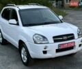 Білий Хендай Туксон, об'ємом двигуна 1.98 л та пробігом 163 тис. км за 8900 $, фото 3 на Automoto.ua
