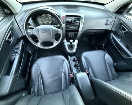 Белый Хендай Туксон, объемом двигателя 2 л и пробегом 163 тыс. км за 8700 $, фото 13 на Automoto.ua