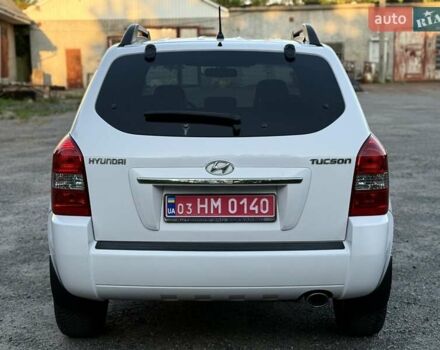 Білий Хендай Туксон, об'ємом двигуна 1.98 л та пробігом 163 тис. км за 8900 $, фото 11 на Automoto.ua