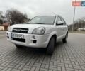 Белый Хендай Туксон, объемом двигателя 1.98 л и пробегом 136 тыс. км за 9000 $, фото 1 на Automoto.ua