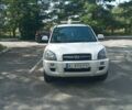 Белый Хендай Туксон, объемом двигателя 1.98 л и пробегом 220 тыс. км за 9200 $, фото 1 на Automoto.ua
