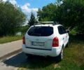 Белый Хендай Туксон, объемом двигателя 2 л и пробегом 220 тыс. км за 9200 $, фото 1 на Automoto.ua