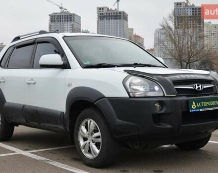 Білий Хендай Туксон, об'ємом двигуна 1.98 л та пробігом 186 тис. км за 8777 $, фото 1 на Automoto.ua